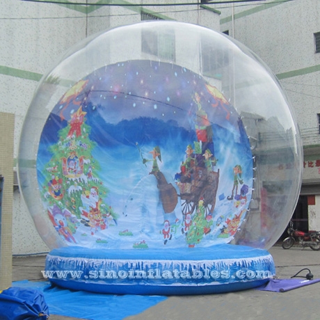 human giant inflatable Christmas snow globe