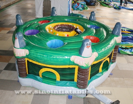 giant inflatable human whack a mole game