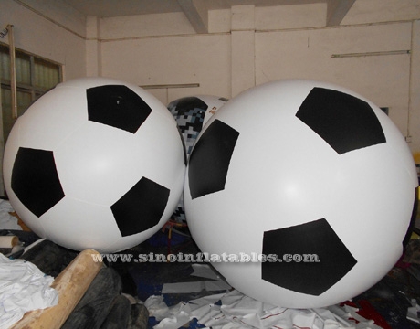 Giant floating inflatable helium football